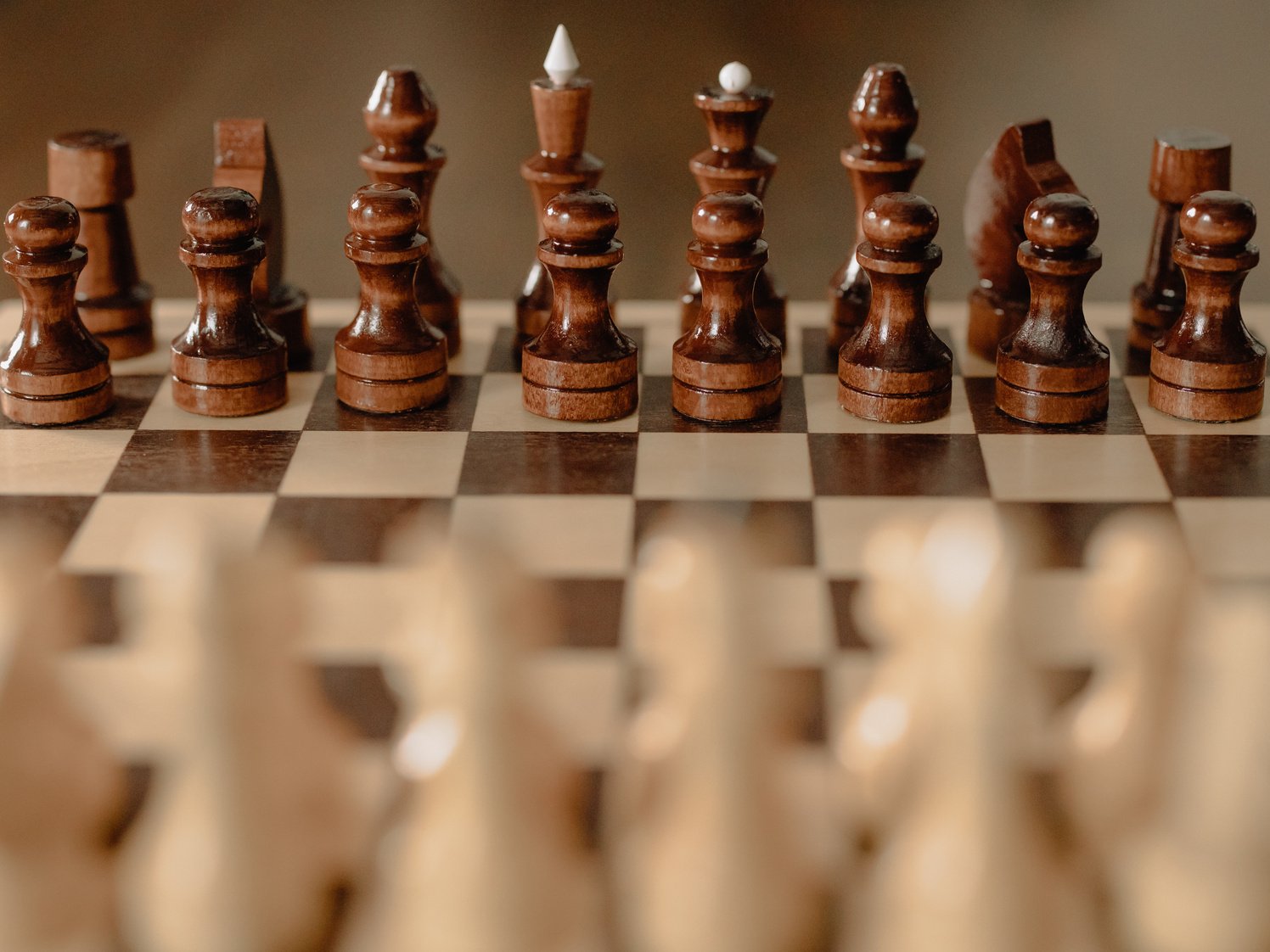 Brown Chess Piece on Chess Board